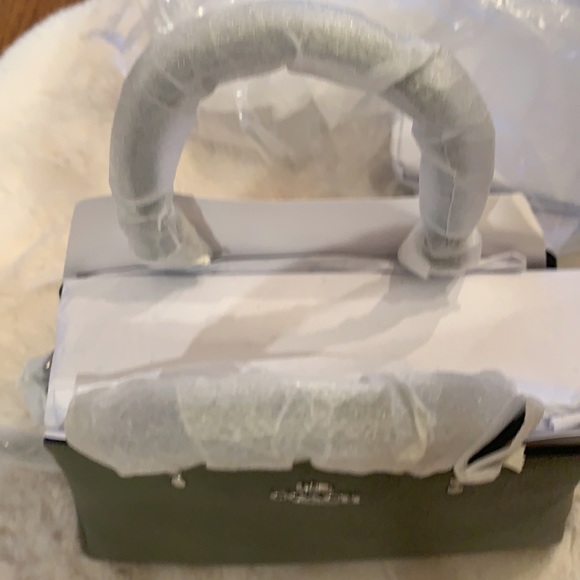 NWT. Coach Minicarryall - Picture 3 of 7